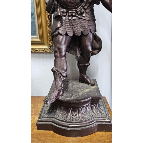 92 - A large antique/ vintage spelter figure of a Roman soldier, measuring 57cm tall.