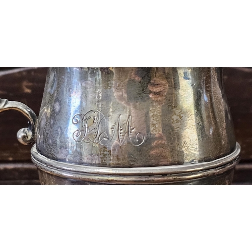 94 - An antique Sterling Silver jug, produced by J Wilmot, fully hallmarked for Birmingham, weighing 97g.