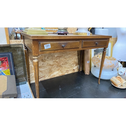 151 - A vintage coffee table with leather inset and two drawers.