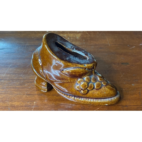 15 - A rare Early 19th Century ceramic money box in the style of a shoe.