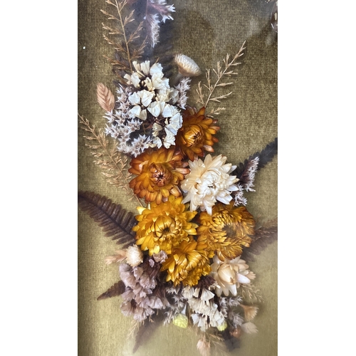 20 - A gilt framed picture, made from dried flowers.