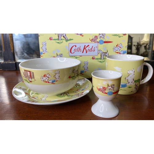 31 - A four piece Cath Kidson ceramic children's breakfast set.