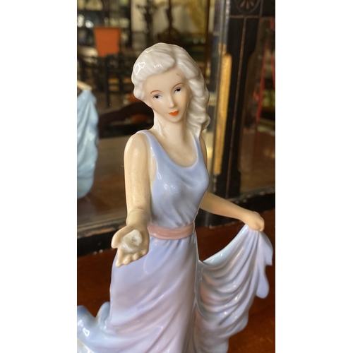 54 - A large Royal Doulton figurine 'Elaine' HN2791 and another.