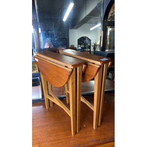 71 - A pair of vintage/ Mid Century drop leaf tables.