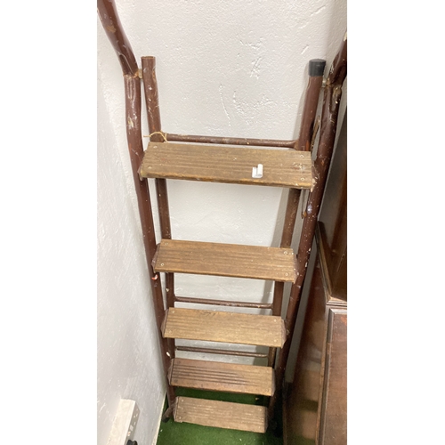 76 - A vintage folding step ladder.