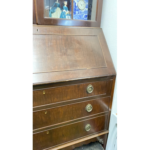 77 - An antique style bookcase bureau  with glazed top section, measuring 220x90x48cm.