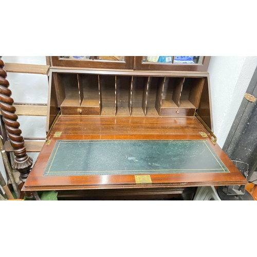 77 - An antique style bookcase bureau  with glazed top section, measuring 220x90x48cm.