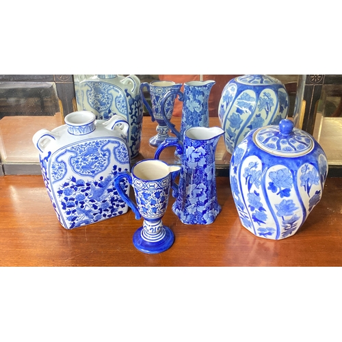 78 - A Regency pottery blue and white patterned jug and three other pieces.