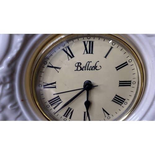 82 - A Belleek mantle clock.