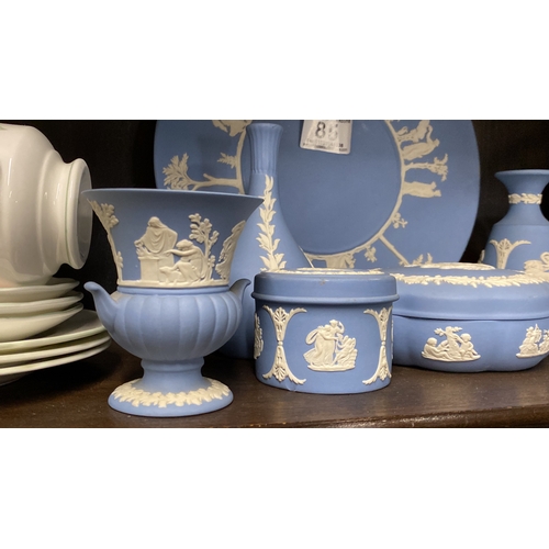 85 - A large collection of Wedgwood Jasper Ware pale blue.