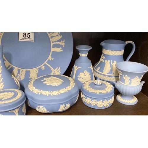 85 - A large collection of Wedgwood Jasper Ware pale blue.