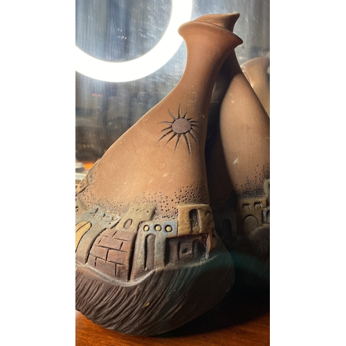 9 - A decorative studio pottery vessel.