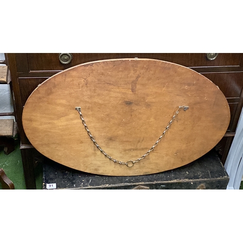 90 - A large vintage frameless oval wall mirror, 80cm.