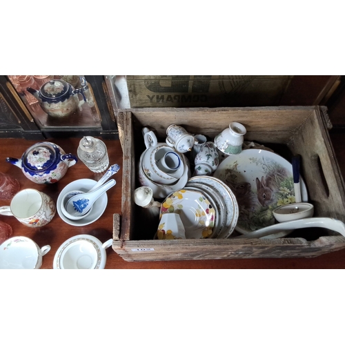 102 - A mixed lot of ceramics in an Irish wooden crate.