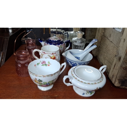 102 - A mixed lot of ceramics in an Irish wooden crate.