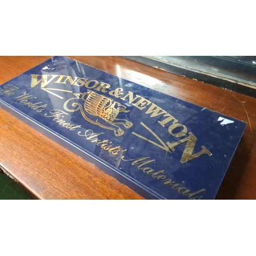 112 - A vintage Winsor & Newton advertising display with the iconic griffin logo and the phrase 