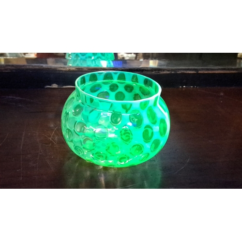 120 - A stunning vintage uranium glass bowl with bubble effect.