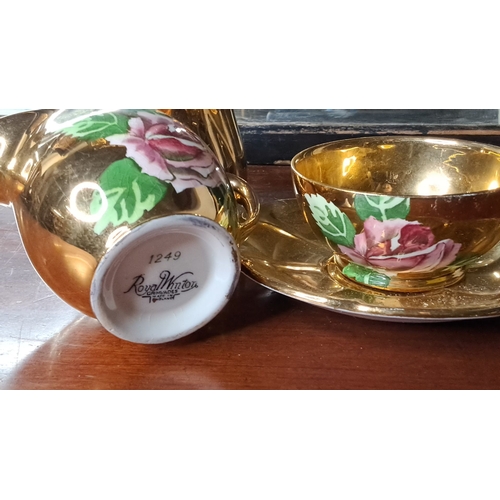 122 - A three piece Royal Winton 'Golden Age' tea set.