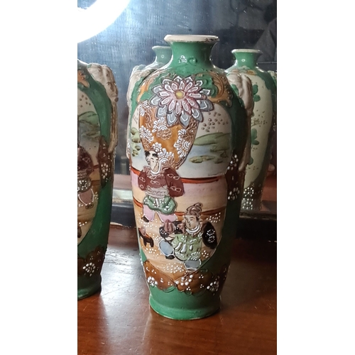 123 - A pair of antique Oriental style vases.