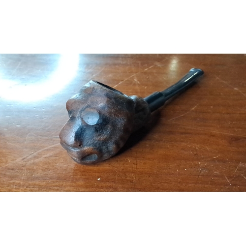 124 - A vintage wooden mask head pipe.