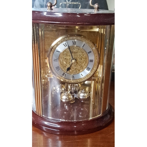 125 - A stunning Hermle anniversary mantle clock.