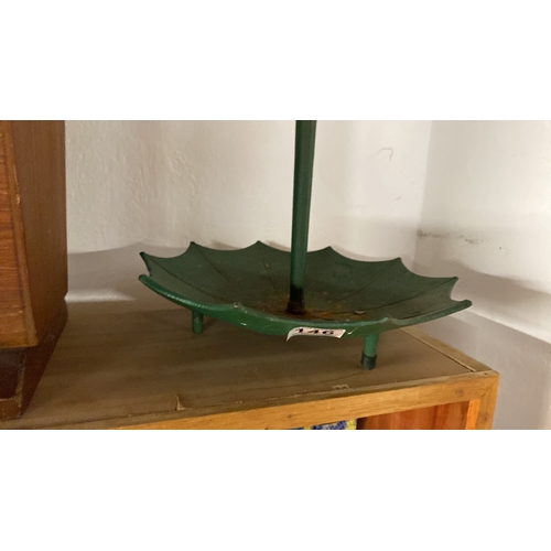 146 - A metal umbrella stand.