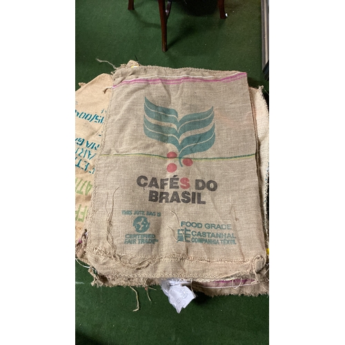 175 - A large lot of vintage hessian sacks.