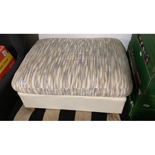 177 - An upholstered footstool with removable covers.