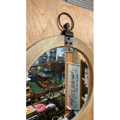 193 - An industrial style wooden framed wall mirror with hook.