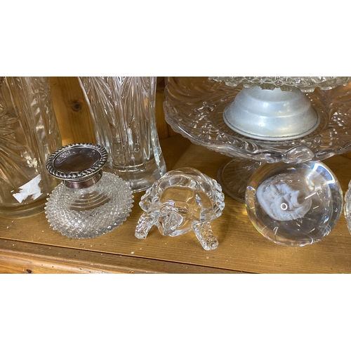 206 - A collection of assorted crystal including a Buddha crystal ball, a Galway crystal candlestick, a gl... 