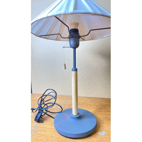 219 - A modern table lamp and shade.