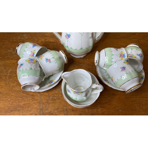 228 - A vintage Royal Standard coffee set with floral design.