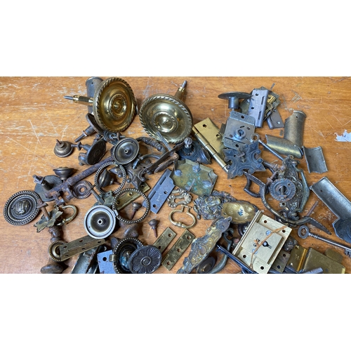 234 - An assorted lot of hinges, drawer pulls, brackets etc.