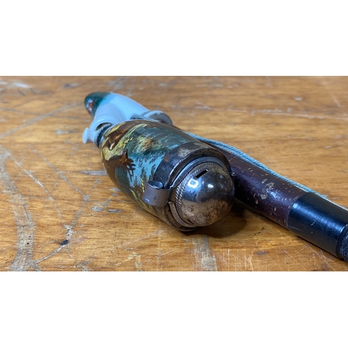 251 - A ceramic pipe.