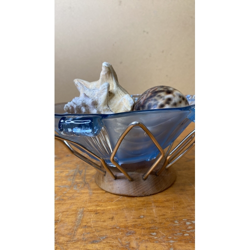 256 - A vintage teak and metal fruit bowl, a glass bowl and a lot of sea shells.