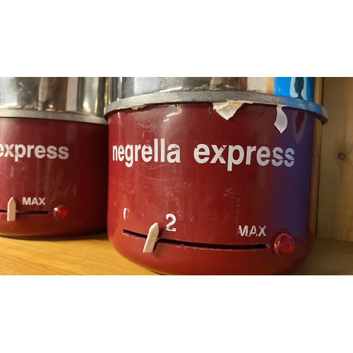 258 - Three Negrella Express fondue pots.