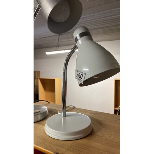 260 - Two angle poise desk lamps.