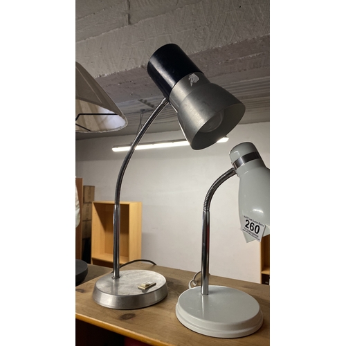 260 - Two angle poise desk lamps.