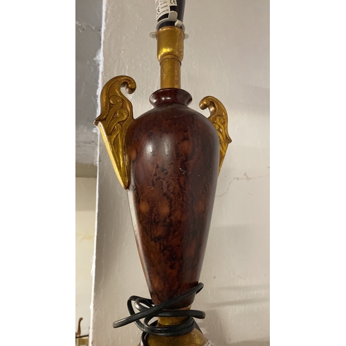 264 - A gilt and marble effect table lamp base.