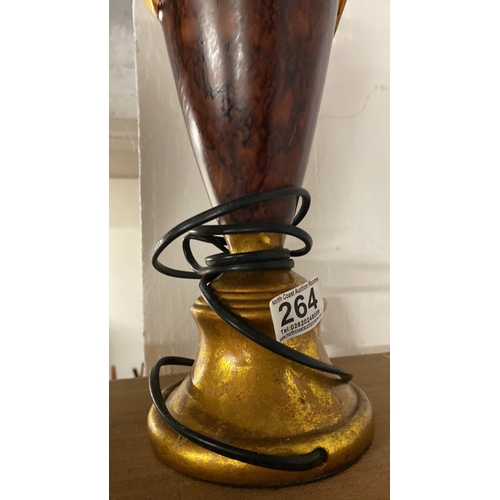 264 - A gilt and marble effect table lamp base.