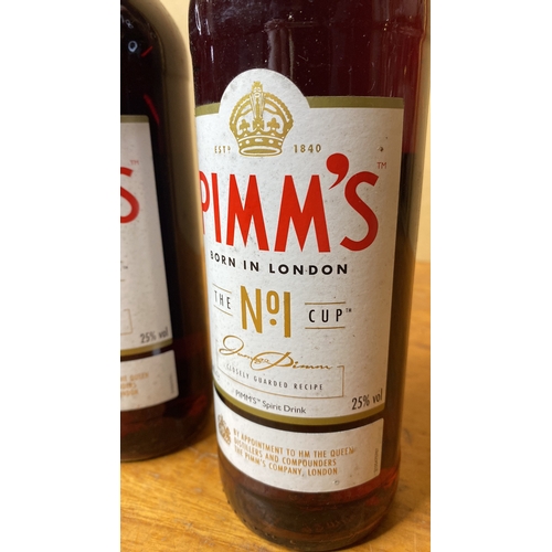 271 - Three bottles of 700ml Pimm's liquor.