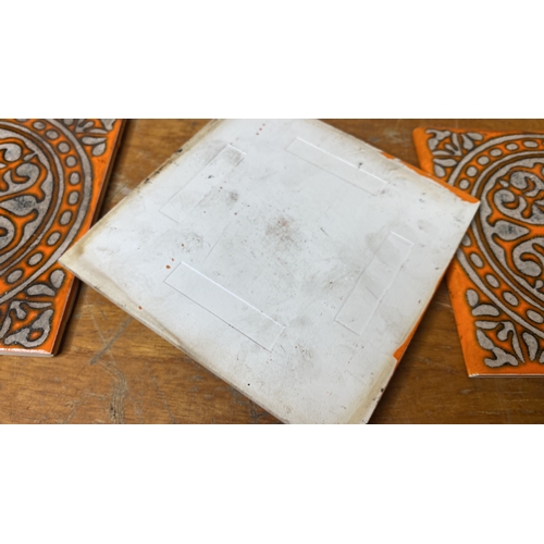 275 - A set of three vintage ceramic tiles.