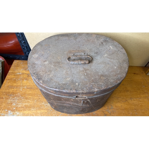 278 - An antique metal hat box.