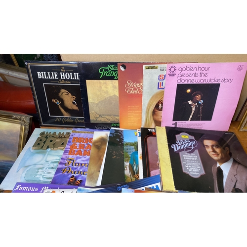 292 - A collection of vintage records/albums to include The Billie Holiday Collection, Eric Delaney and lo... 