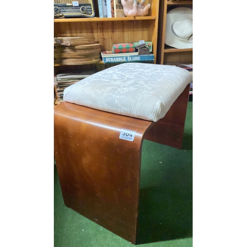 304 - A vintage dressing table stool.