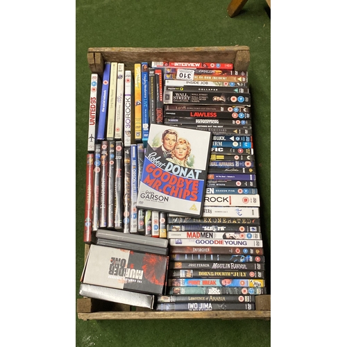 310 - Two boxes of assorted DVD's.