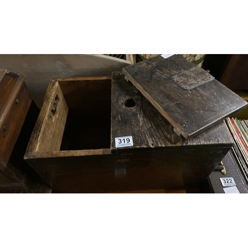 319 - An antique wooden ballot box with wrought iron detail.