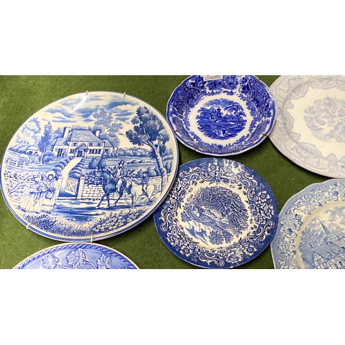 328 - A lot of blue and white plates.