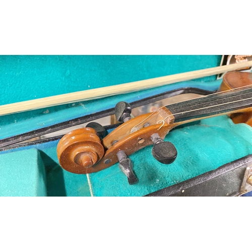 352 - A Parrot Music wooden cased violin with case.