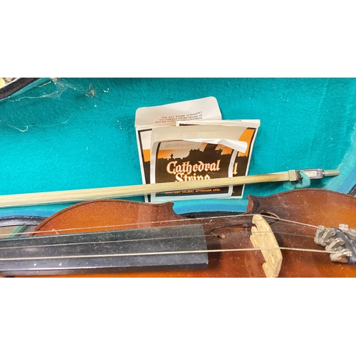 352 - A Parrot Music wooden cased violin with case.